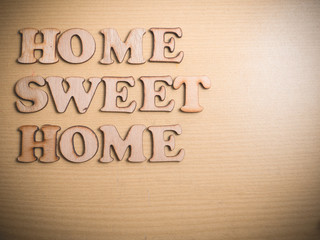 Home Sweet Home in Wooden Word Concept