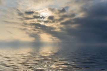 Misty seascape under a dramatic sky