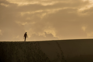 silhouette of man in the desert