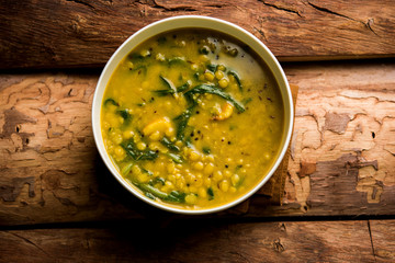 Dal Palak or Lentil spinach curry - popular Indian main course healthy recipe. served in a karahi/pan or bowl. selective focus - obrazy, fototapety, plakaty