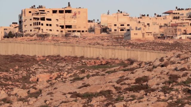 Palestinian village with Security wall North Jerusalem Security wall divide between Palestinian and Israeli village