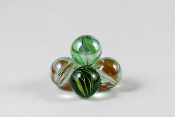 Glass marbles with colored glass inside