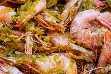 Background of the fresh boiled king shrimps with the oriental herbs