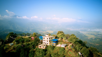 Ancient buddhist monastery in Himalayas Nepal from air