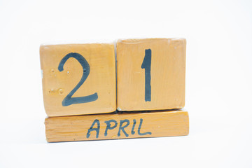 april 21st. Day 21 of month, handmade wood calendar isolated on white background. spring month, day of the year concept.