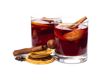 mulled wine with spices isolated on white background