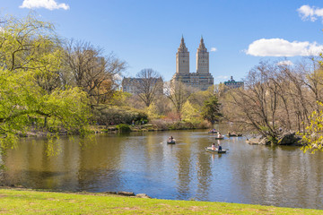 Fototapeta na wymiar People boating in The lake at Central Park on nice weather day in New York City,USA