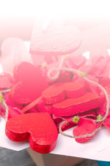 girl holding a heart with chopsticks