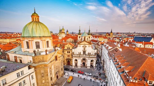 Scenic aerial view over Crusaders church and Clementinum in Prague, Czech republic, at daytime. Beautiful travel background. 4K timelapse.