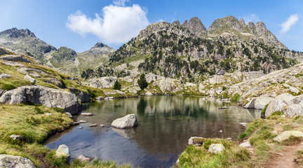 Naklejka na ściany i meble High Mountain Lake in the Pyrenees