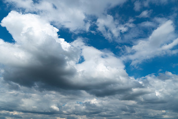 ์Nature background of Bright light sky and white and dark cloud before rainy.