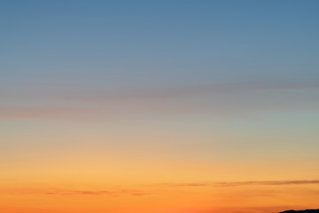Sky gradient from blue to orange sunset