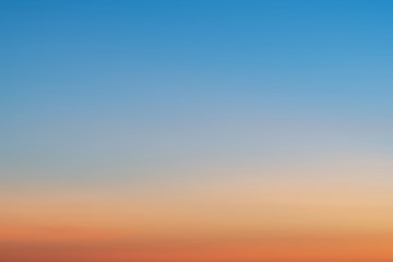 Sky gradient from blue to orange sunset