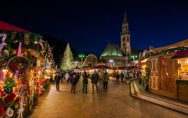 Bolzano Christmas market in the evening. Trentino Alto Adige, Italy. - obrazy, fototapety, plakaty