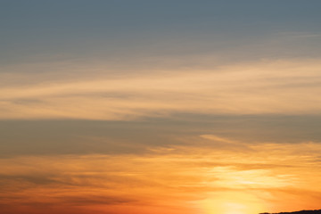 Sky gradient from blue to orange sunset