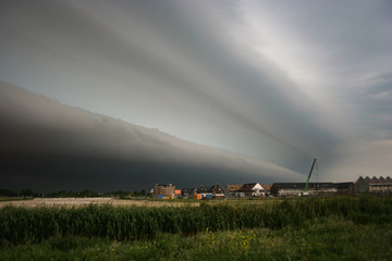 Approaching shelf cloud of a severe thunderstorm over The Netherlands.  Severe weather is approaching: expect a lot of wind, blowing sand and torrential rain....