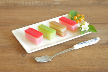 Layer sweet cake (Khanom Chan) Thai traditional dessert in colorful bar shape , Thai food / Thai dessert sweet and delicious. Copy space for texts