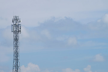 Giant antenna on blue sky and white cloud background