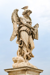 Fototapeta na wymiar Angel with the Whips Statue in Hadrian Bridge, Rome, Italy