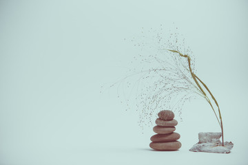 Spa still life with stacked of stone with a beautiful branch