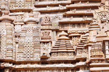 Ancient bas-relief at famous erotic temple in Khajuraho, India.