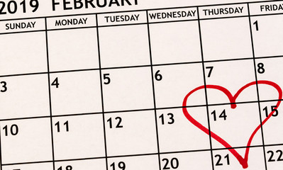 monthly calendar February detail view with a red heart drawn on the fourteenth for Valentine's Day as a reminder