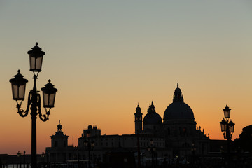 silhouette of the Basilica of Santa Maria della Salute at sunset in Venice