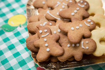 horizontal image with detail of a tray with nice Christmas cookies