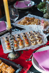 Plates with tasty biscuits on table