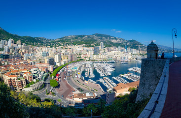 Aerial view over Monaco city, Generic architecture around seaside and famous port in summertime -...