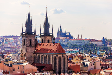 Obraz premium Church of Our Lady before Tyn and the Prague Castle on the backg