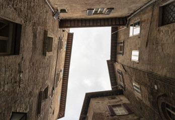 Fototapeta na wymiar Low angle of a building facade in Perugia - Italy