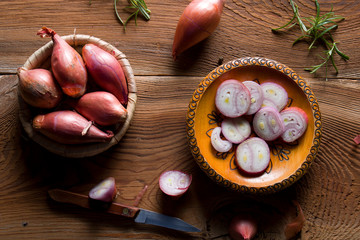 Fresh natural onion on the wood.