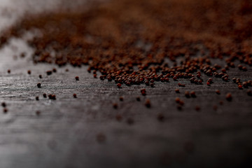 mustard seed on black background