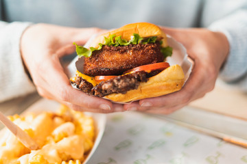 double cheeseburger with tomato and onion
