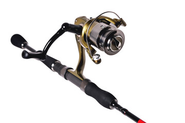 fishing reel on a fishing rod, white background close-up, copy space