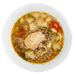 Chicken soup with buckwheat groats. On a white background
