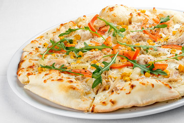 Pizza with chicken and pineapple. On a white background