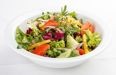 Fresh vegetable salad. On a white background