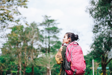 Traveler backpacker asian woman with nature background , concept travel , copy space