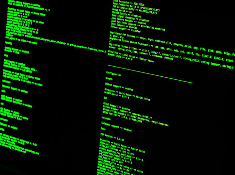 Green code in command line interface on black background. UNIX bash shell