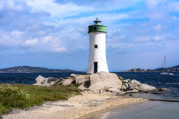 Fototapeta na wymiar Little Palau Lighthouse on Costa Smeralda, Sardinia, Italy 