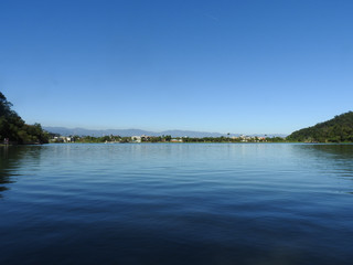 Plum Blossom Lake (Meihua Lake) located at Yilan county, Taiwan. Famous tourist spot for vacation. A natural reservoir.  Blue sky and lake , nature scenery. Feel relaxed and calm. Landscape background