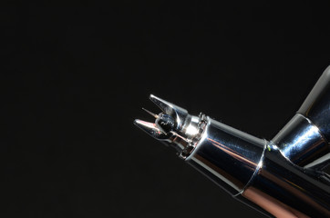 Airbrush tip detail. Needle tip of an airbrush. Approximate view of technical detail.