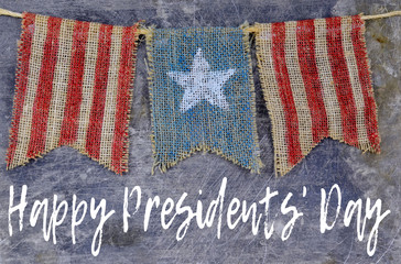 Rustic Memorial Day image of burlap flags painted with stars and stripes on worn steel background....