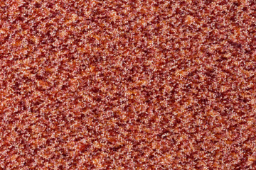 Red textile texture, boucle, fluff surface.	