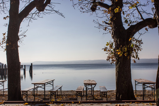 Empty beer garden and beer tables at seeside. Herrsching, Ammersee in autumnal atmosphere