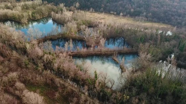 aerial shot from the drone,ponds in the green. Laghetti delle Noghere , Muggia Italy 