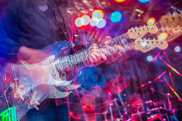 Electric guitar player shaky blurred multiples exposure