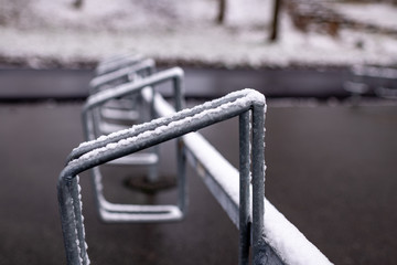 bike rack in steel in the winter with snow